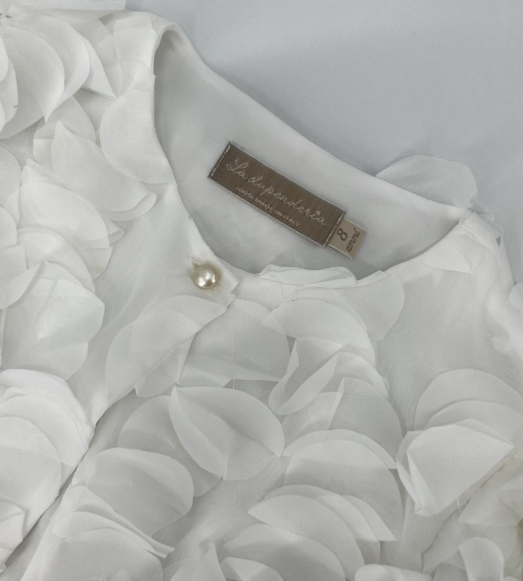 WHITE JACKET WITH PETALS
